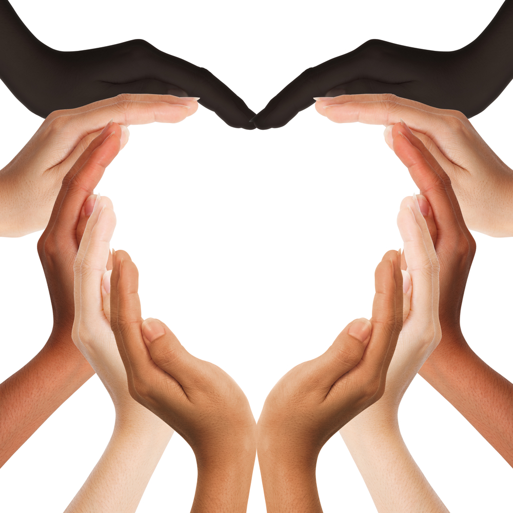Multiracial Human Hands Making A Heart Shape On White Background