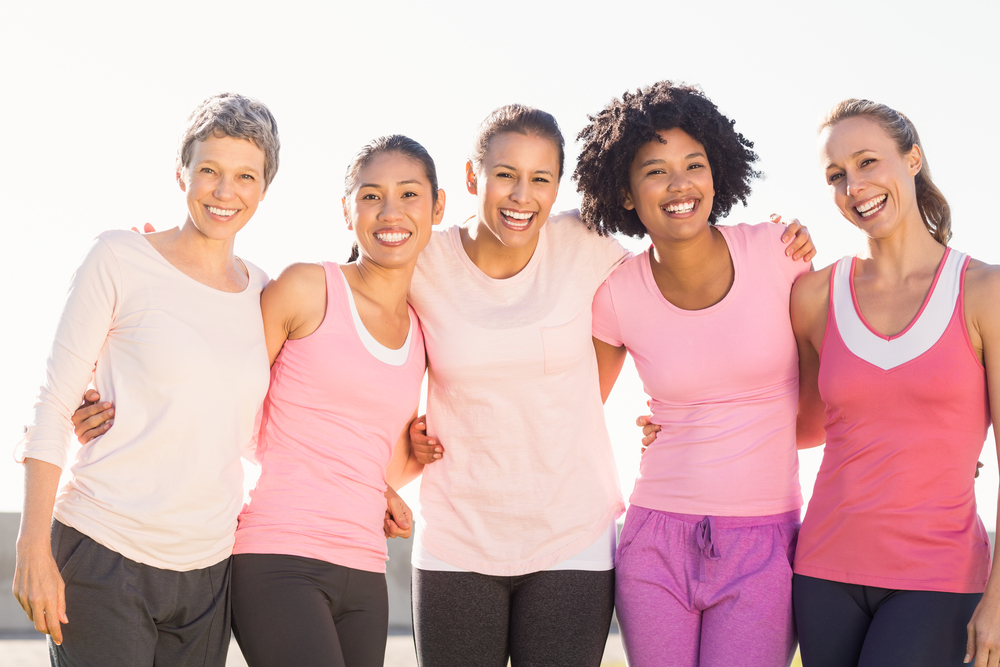 Portrait Of Smiling Women Wearing Pink For Breast Cancer In Parkland